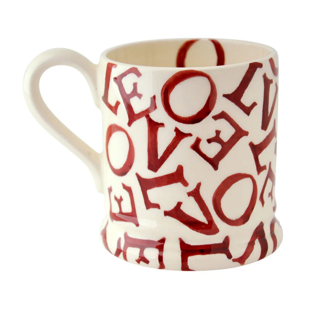 Mug with red 'LOVE' pattern on a white background