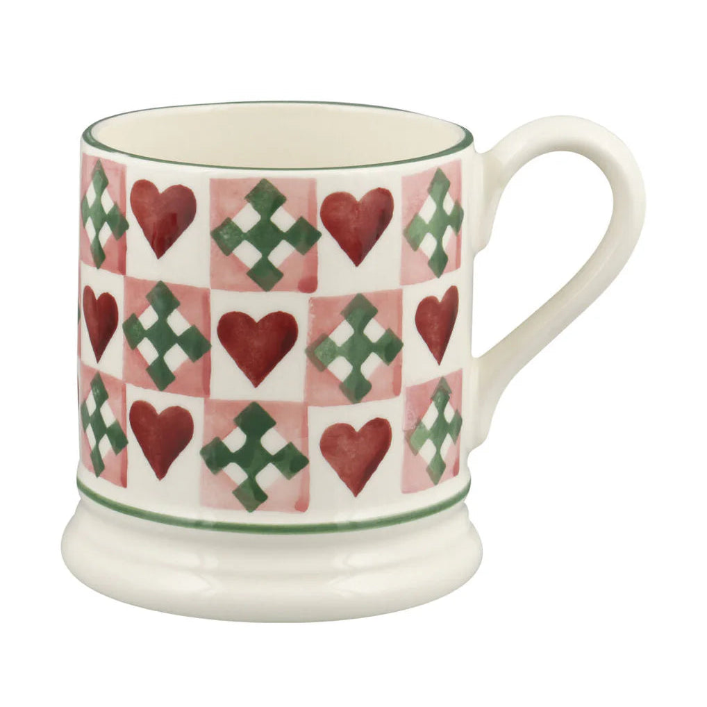 Emma Bridgewater Mug with heart and cross pattern on a white background