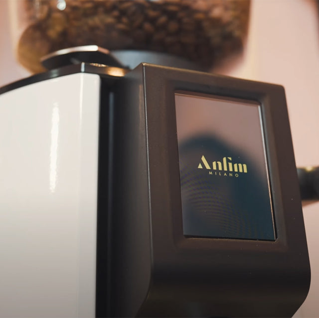 Close-up of a high-end electronic device with a brand logo on a blurred background
