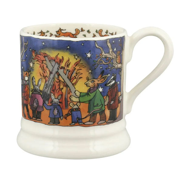 Mug with a colorful design of animals around a campfire on a blue background