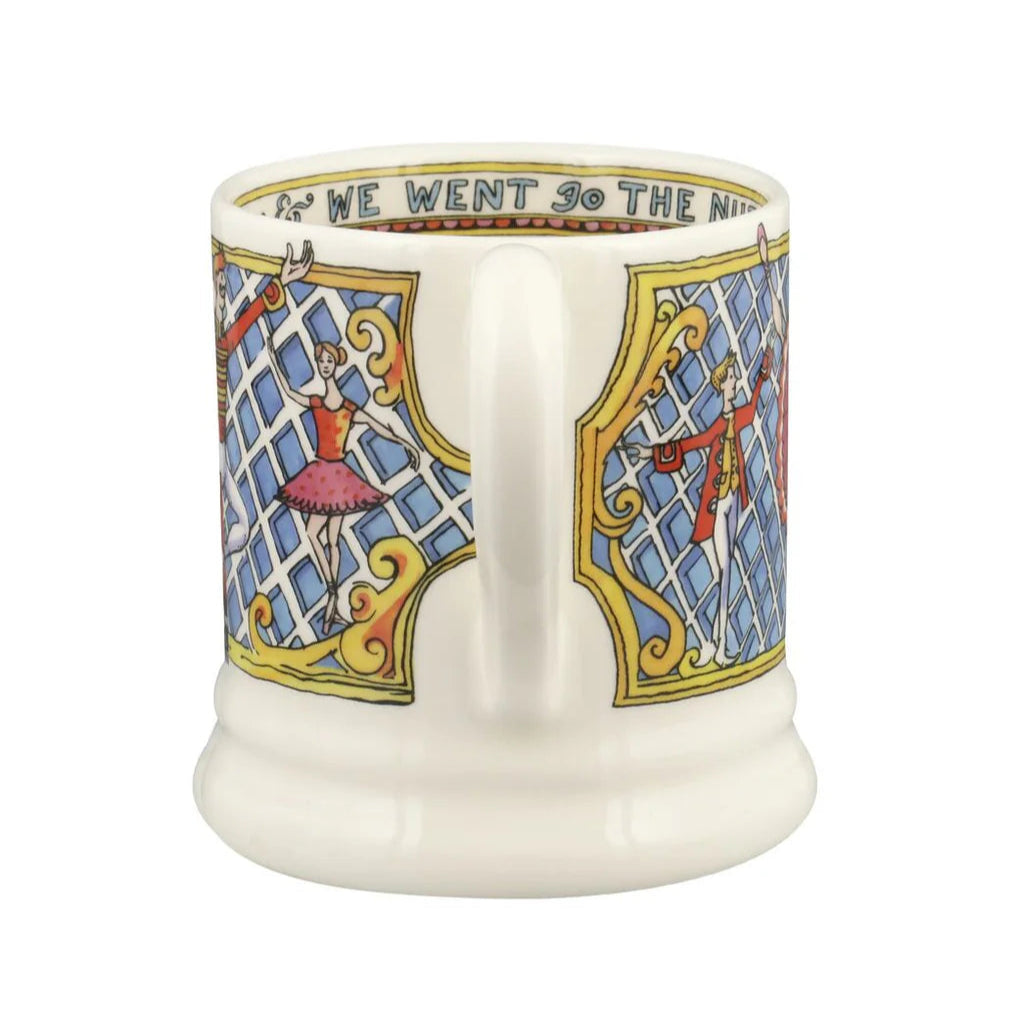 Mug with decorative design and text on a white background