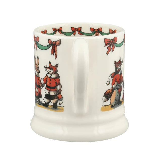 White mug with festive fox design on a white background