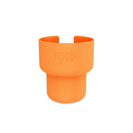 Orange silicone cup holder with 'frank green' branding on a white background