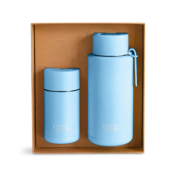 Two blue thermos bottles in a cardboard box with 'frank green' branding.