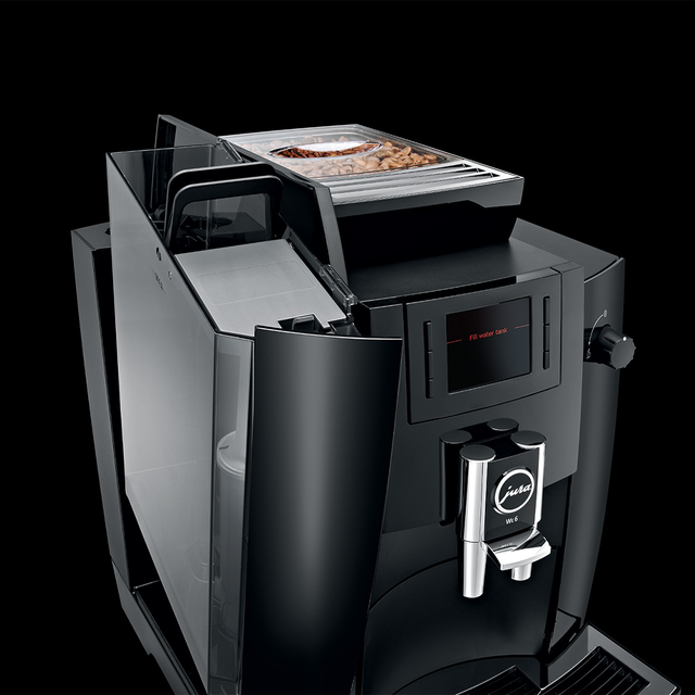 JURA WE6 professional coffee machine with user-friendly display, ideal for preparing a variety of coffee specialties in small to medium-sized workplaces.