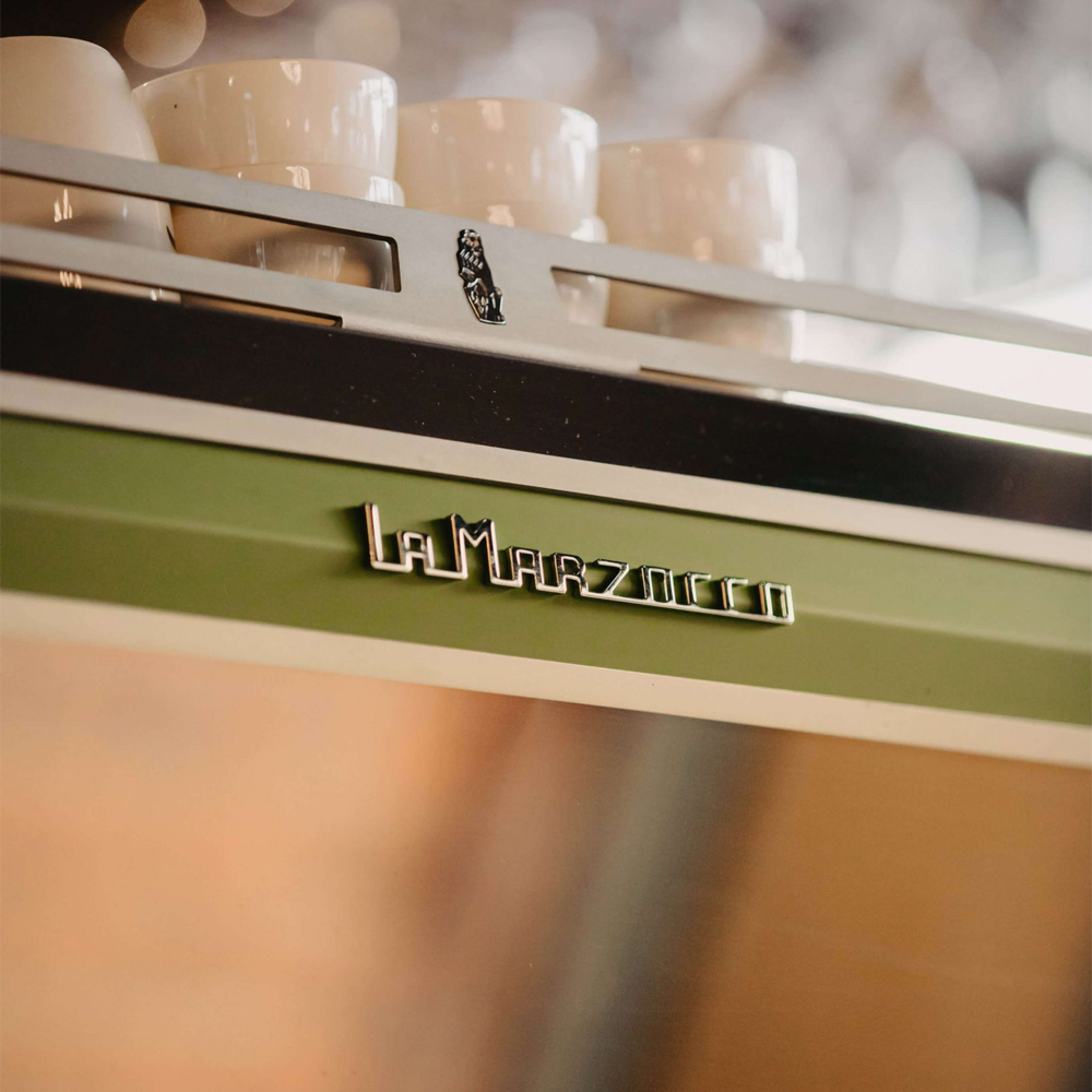 La Marzocco KB90 espresso machine with innovative straight-in portafilter and dual boiler system, ideal for high-volume coffee shops.