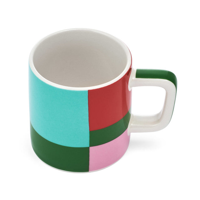 Color-blocked mug with green, red, and pink sections on a white background