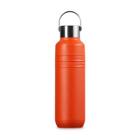 Orange water bottle with a silver cap on a white background