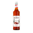 A bottle of Monin Coffee Syrup with cinnamon roll flavor, 1 liter size.