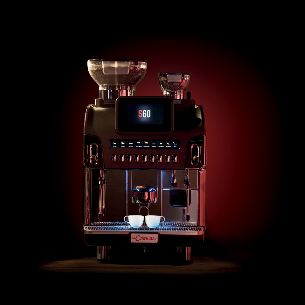 La Cimbali S60 high-capacity bean-to-cup coffee machine, ideal for busy cafés, restaurants, and large venues. Features a 10.4-inch touchscreen, advanced hot and cold milk foam technology, and customisable options. Built for efficiency and durability, it delivers consistent, barista-quality coffee for high-demand environments