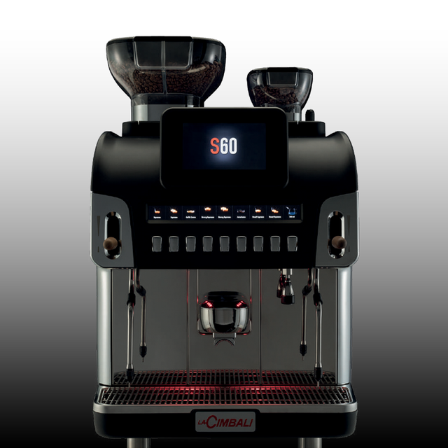 La Cimbali S60 high-capacity bean-to-cup coffee machine, ideal for busy cafés, restaurants, and large venues. Features a 10.4-inch touchscreen, advanced hot and cold milk foam technology, and customisable options. Built for efficiency and durability, it delivers consistent, barista-quality coffee for high-demand environments
