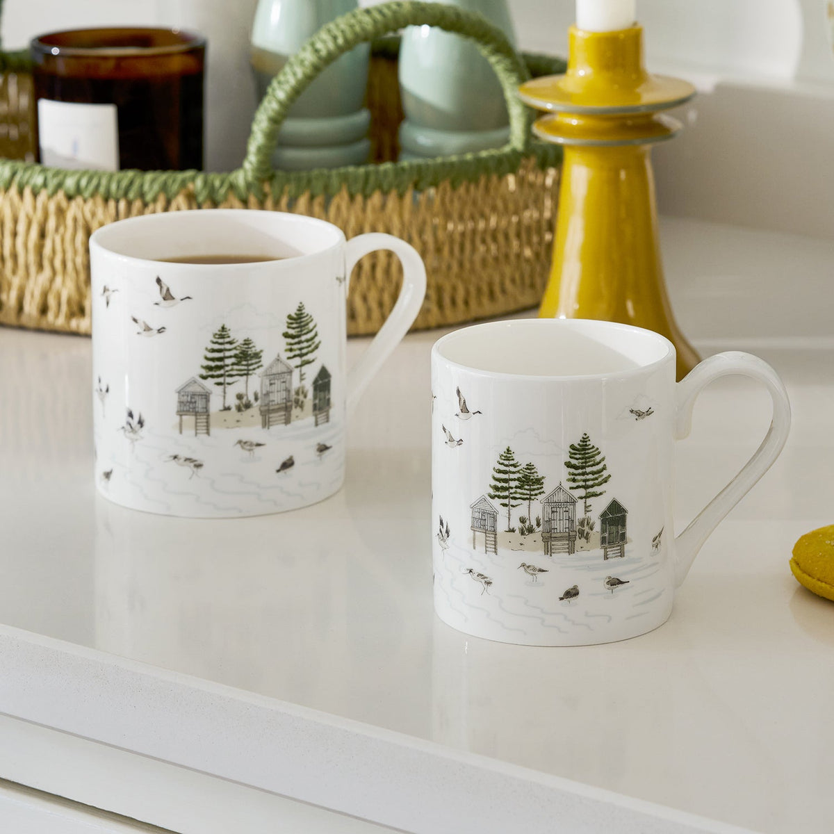 Sophie Allport Sea Birds mugs styled together on a kitchen worktop