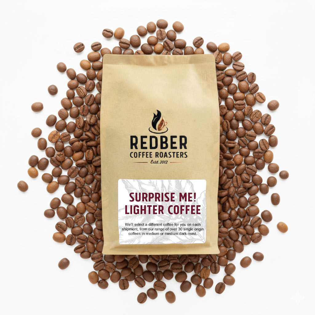 Redber Coffee Roasters package surrounded by coffee beans on a white background