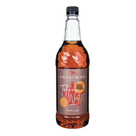 Bottle of Sweetbird Toffee Nut syrup on a white background