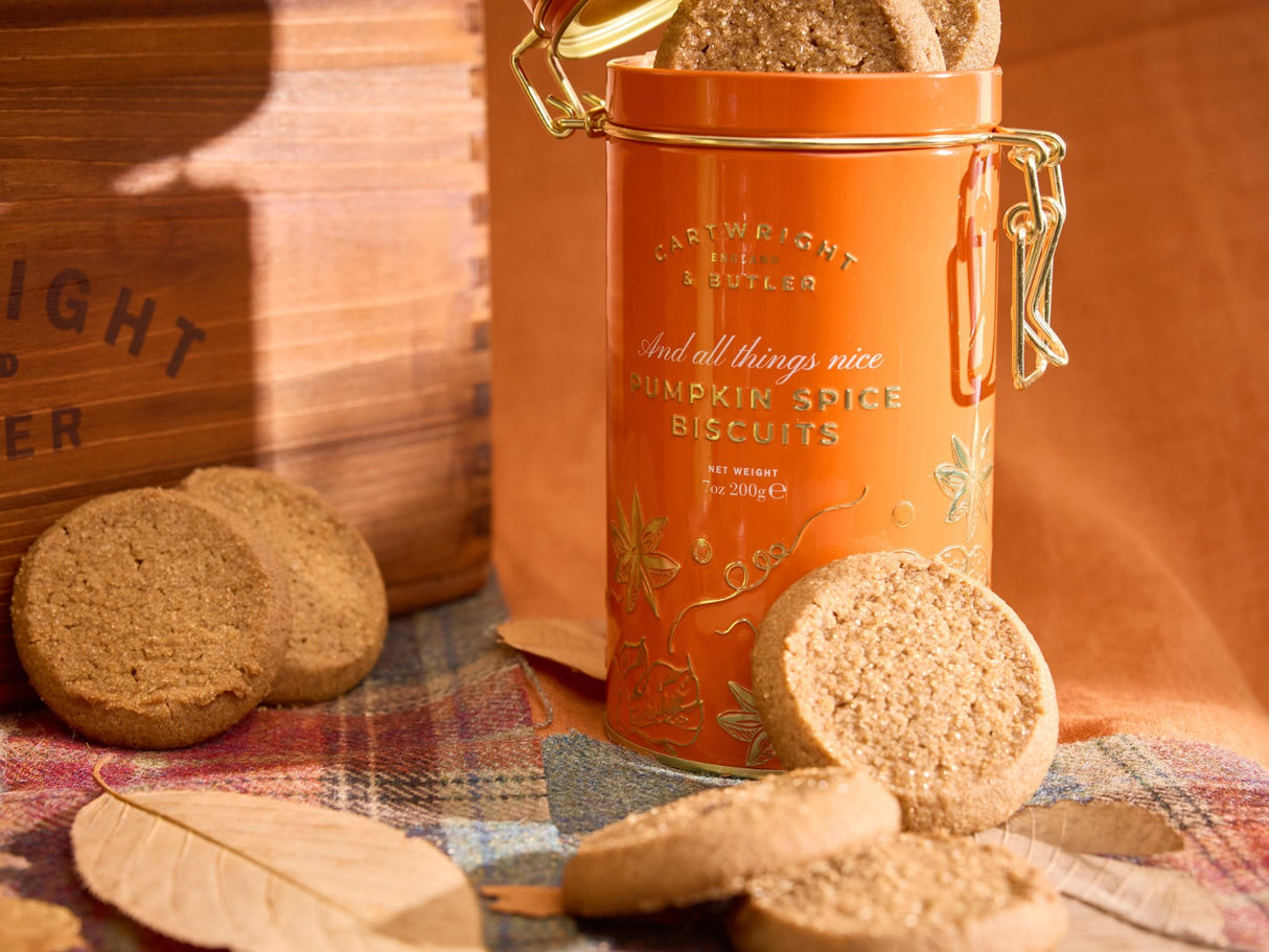 Pumpkin spice biscuits with tea in an autumn setting