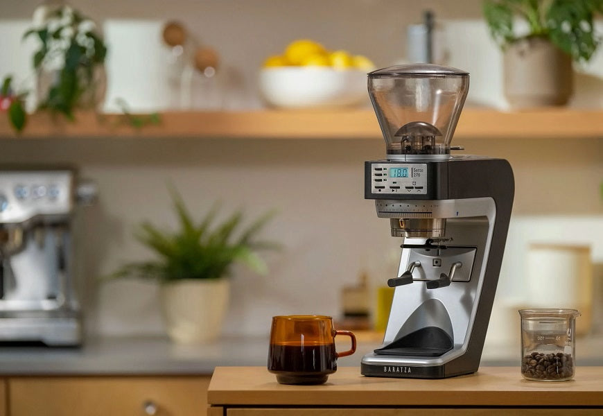 Barazta coffee grinder and cup of coffee