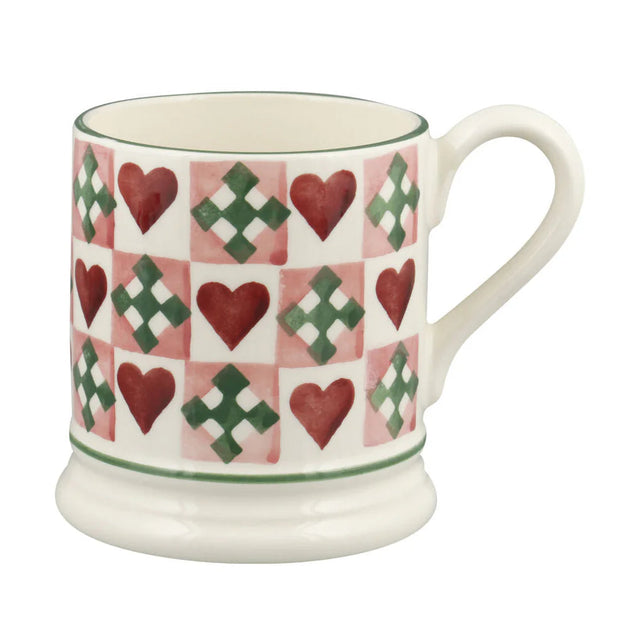 Emma Bridgewater Mug with heart and cross pattern on a white background