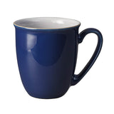 Blue mug with a white interior on a white background