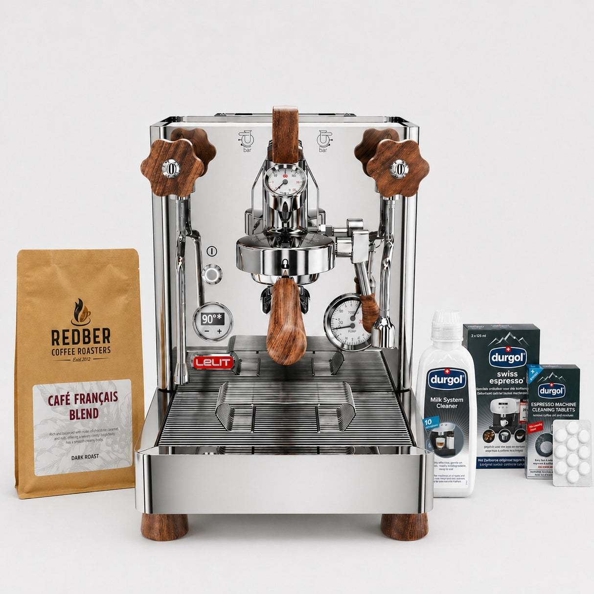 Espresso machine with coffee beans and accessories on a white background