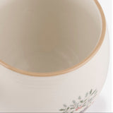 Sophie Allport Close-up of the Christmas Puddings mug interior and coloured rim