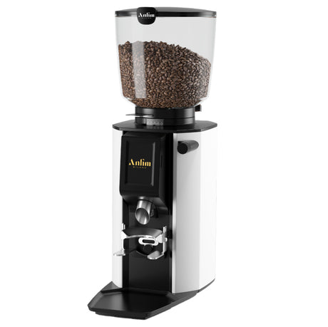 Coffee grinder with coffee beans on a white background