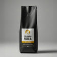 Coffee bag labeled 'Colombia Huila' on a gray background