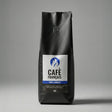 Black coffee bag with 'Café Français' label on a gray background
