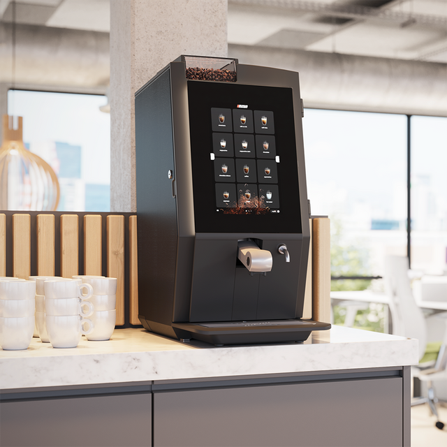 Bravilor Esprecious 22 Bean-to-Cup Coffee Machine – modern design with user-friendly touchscreen, dual canisters for coffee beans and instant ingredients, automatic rinsing program, and capacity for up to 220 cups per day. Perfect for large-scale environments.