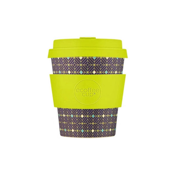 Reusable coffee cup with geometric pattern and lime green lid on a white background