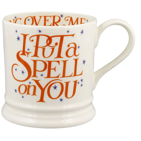 White mug with orange text 'I PUT A SPELL ON YOU' on a white background