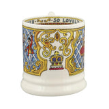 Decorative mug with intricate designs and text on a white background