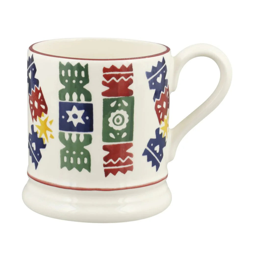White mug with colorful geometric pattern on a white background
