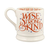 White mug with red and blue text on a white background