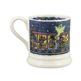 Decorative mug with cartoon characters on a blue background