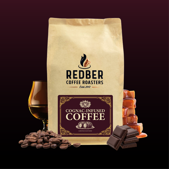 Redber Coffee Roasters Cognac-Infused Coffee package with coffee beans, a glass of alcohol, and chocolate on a dark background.