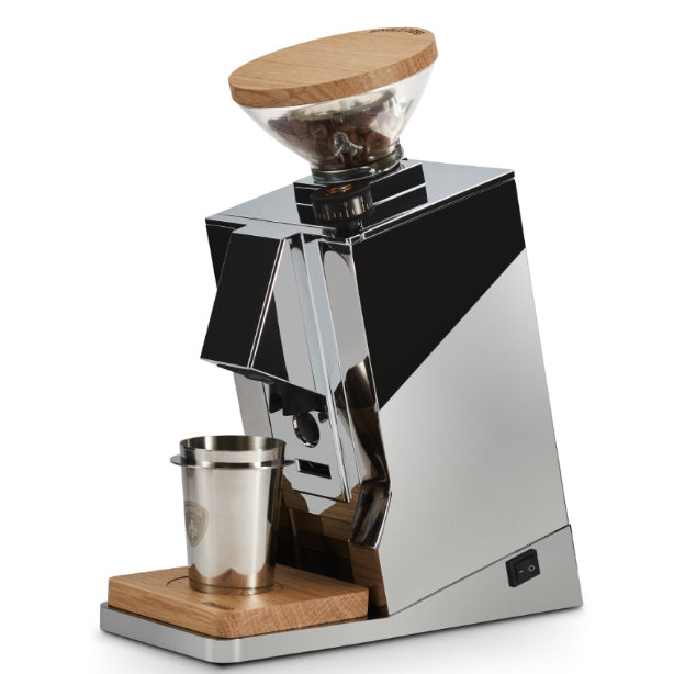 Coffee grinder with wooden top and base on a white background
