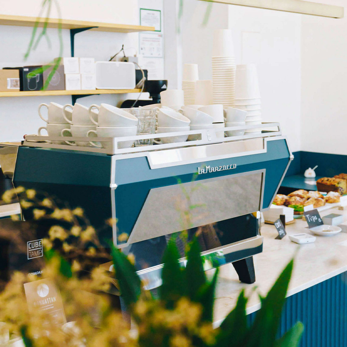 La Marzocco KB90 espresso machine with innovative straight-in portafilter and dual boiler system, ideal for high-volume coffee shops.