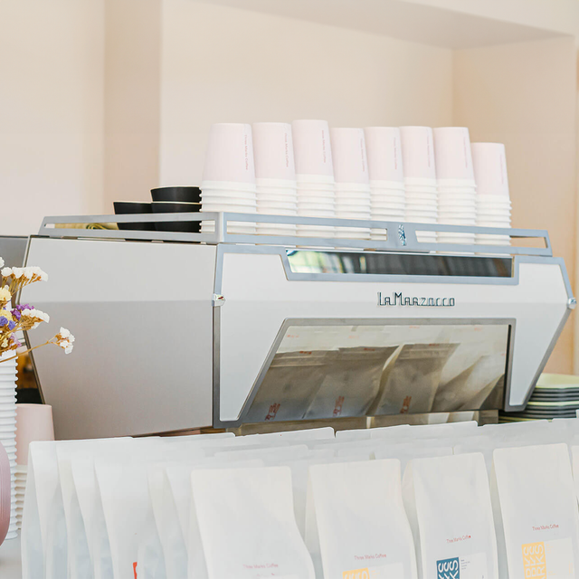 La Marzocco KB90 espresso machine with innovative straight-in portafilter and dual boiler system, ideal for high-volume coffee shops.