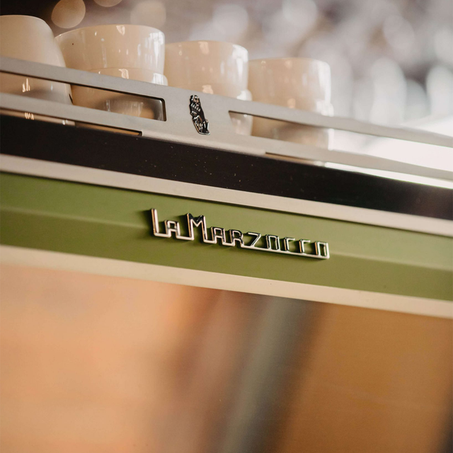 La Marzocco KB90 espresso machine with innovative straight-in portafilter and dual boiler system, ideal for high-volume coffee shops.