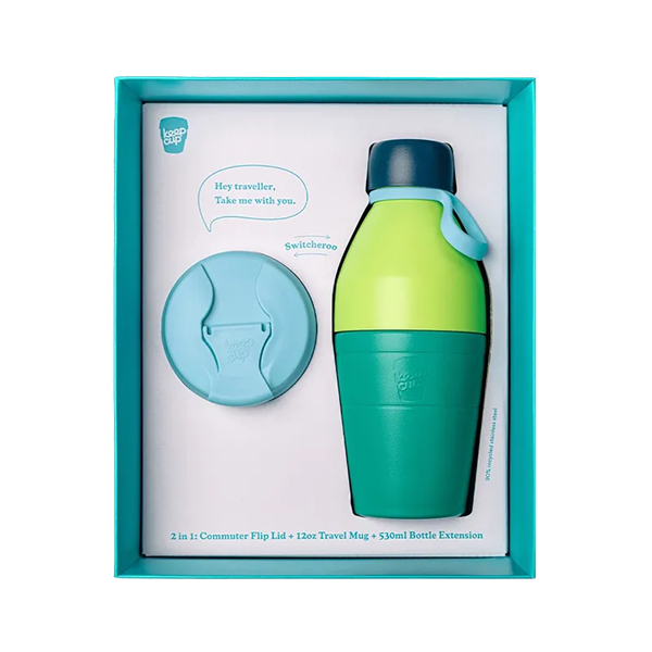 Green and blue travel mug with a matching lid in a box on a white background