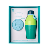 Green and blue travel mug with a matching lid in a box on a white background