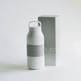 White water bottle with 'Kinto' branding on a light gray background