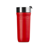 Red travel mug with silver lid on a white background