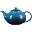 Blue teapot on a white background