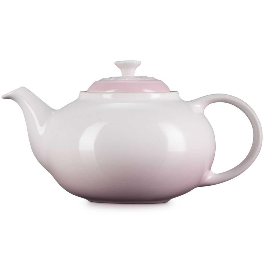 White teapot on a white background