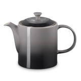 Gray teapot with a white stripe on a white background