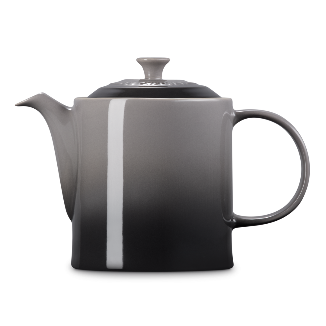 Gray teapot with a white stripe on a white background