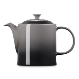 Gray teapot with a white stripe on a white background