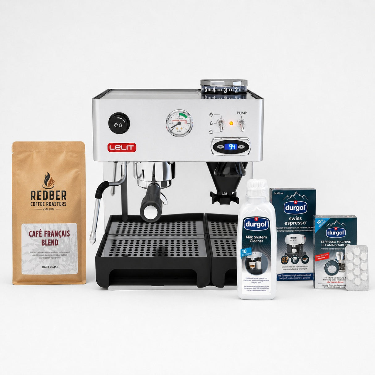 Leit espresso machine with coffee beans, cleaning products, and filters on a white background