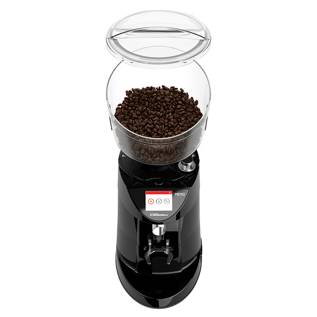 Black coffee grinder with a clear container of coffee beans on a white background
